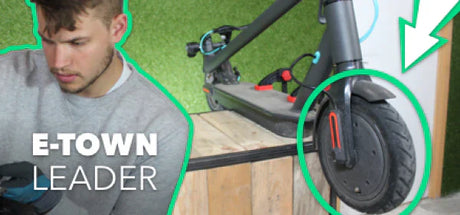 Come cambiare la gomma anteriore di una ETown Leader?